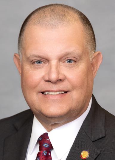 Headshot of  Charles W. Miller